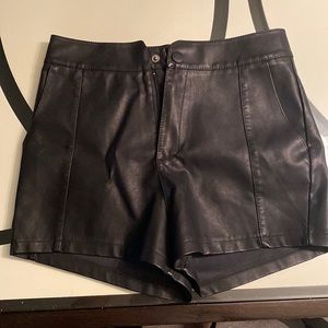 Women’s small size faux leather black shorts . New with tags